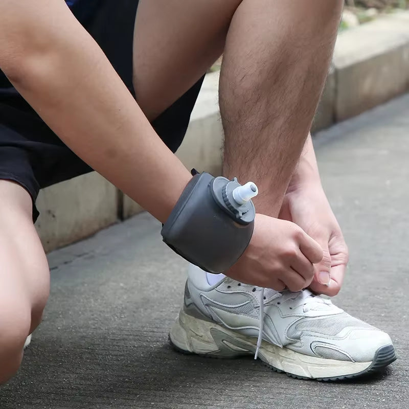 Stay Hydrated on the Go with Our Cool Sports Wrist Water Bottle! Perfect for Cycles, Climbs, and Marathons! 🚴‍♂️🥤 #HydrationGoals #AdventureAwaits