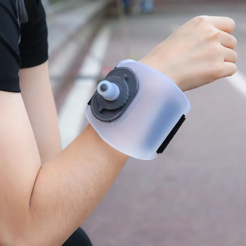 Stay Hydrated on the Go with Our Cool Sports Wrist Water Bottle! Perfect for Cycles, Climbs, and Marathons! 🚴‍♂️🥤 #HydrationGoals #AdventureAwaits